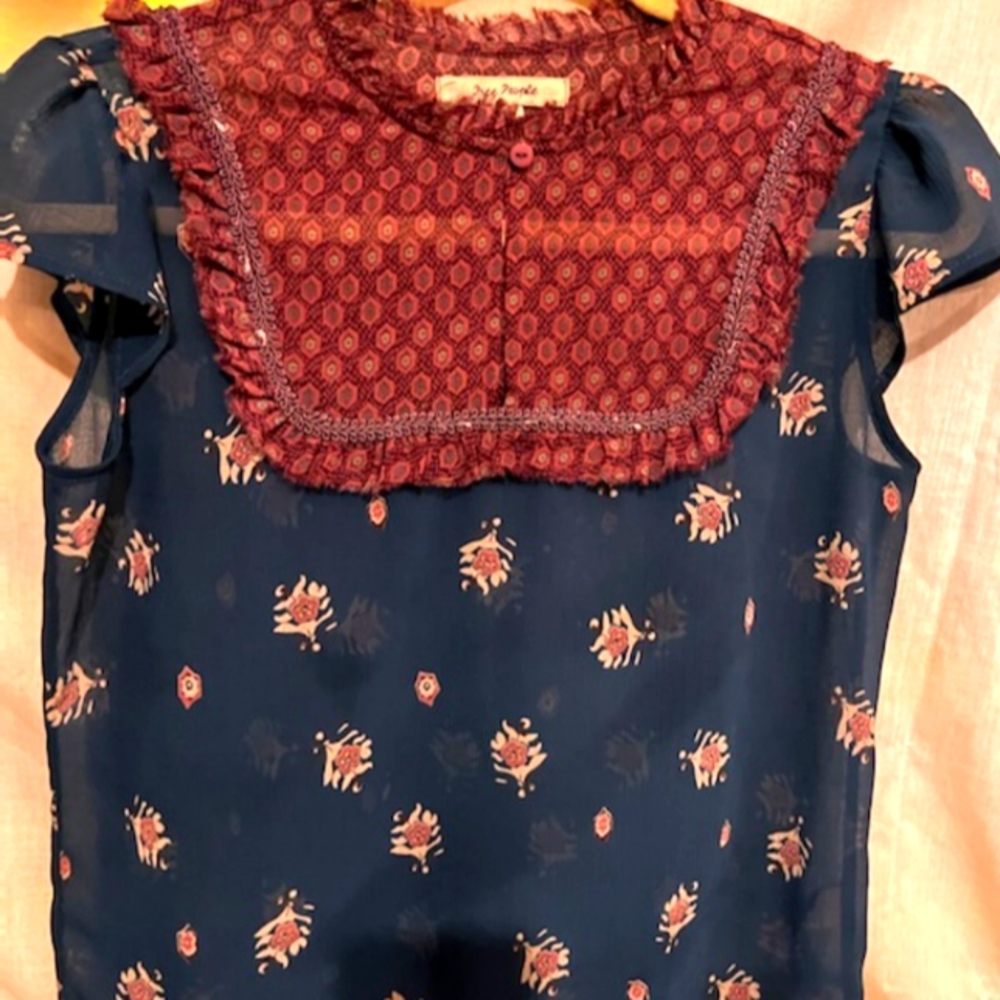 Free People top Size Medium can be worn as small